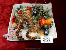 A small quantity of costume jewellery including chains, beads etc.