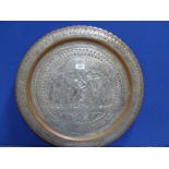 A large white metal on copper wall plaque with Moorish style decoration and scenes of masked