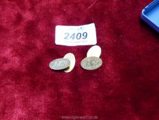 A pair of 9 ct gold cufflinks inscribed J.H.G, makers mark Payton Pepper and Sons Ltd.