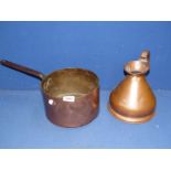 A copper half gallon jug and a copper saucepan.