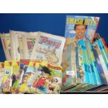 A quantity of annuals and comics including; Beano, Tracey, Mandy, Bunty, etc.