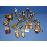 A small quantity of brass and copper items including candle holder, ashtrays, anvil, Corgi etc.