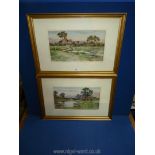 A pair of framed and mounted atmospheric watercolours depicting country landscapes with figures