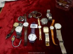 A quantity of ladies and gents wristwatches including Omax, Skagen, Oriosa, Timex etc.