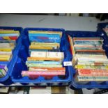 Four blue boxes of mixed books: Driving test theory, children's books,