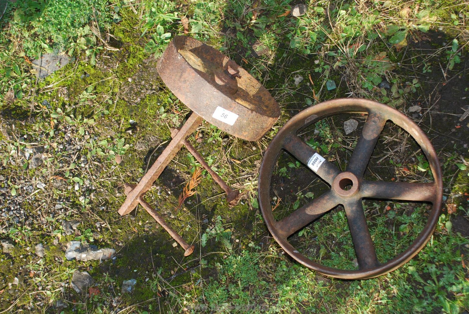 Two cast iron trolley or hut wheels