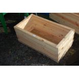 Wooden planter 17'' x 32'' x 13''.