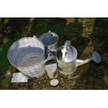 Two galvanised watering cans and two pails