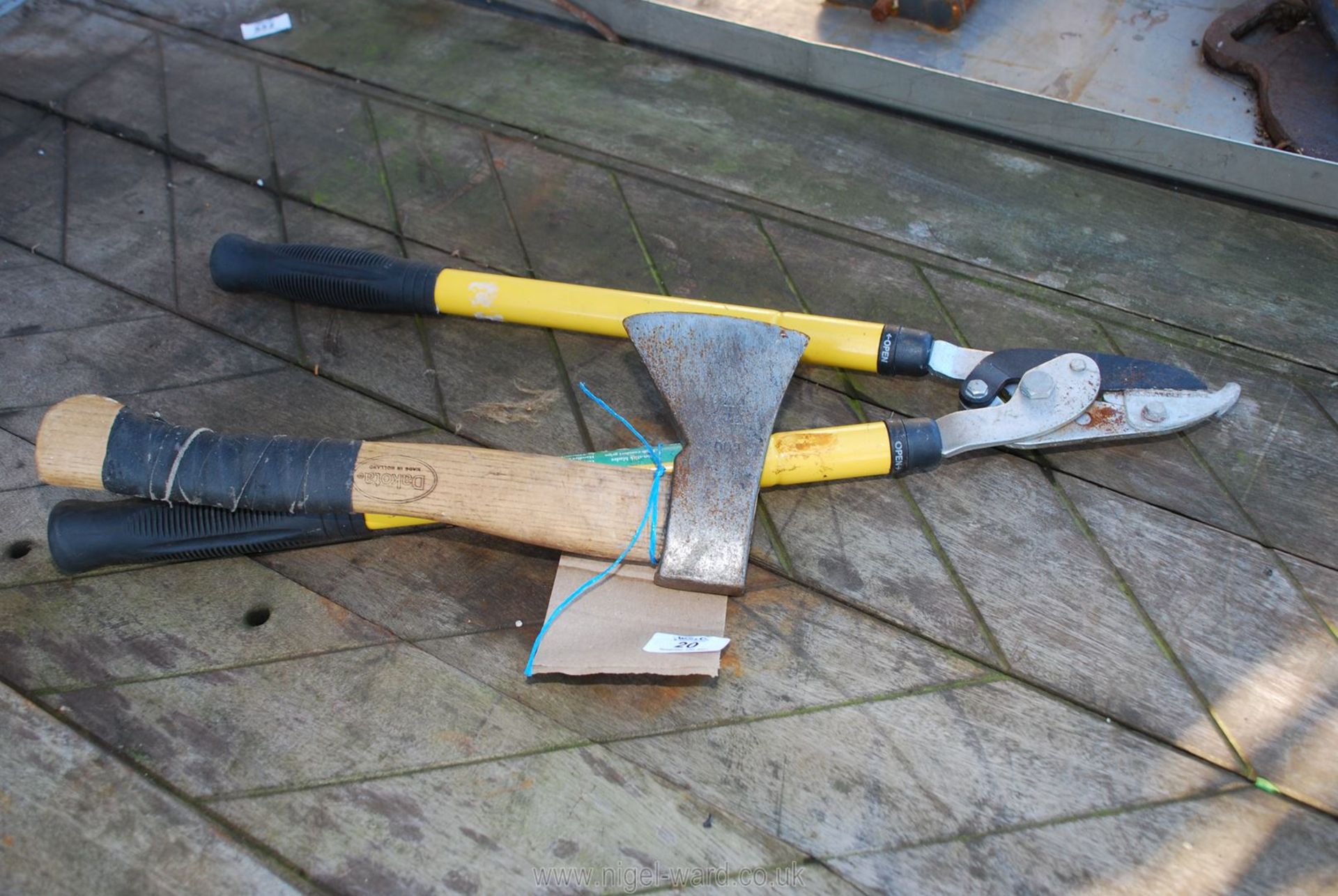 Small axe and garden lopper.