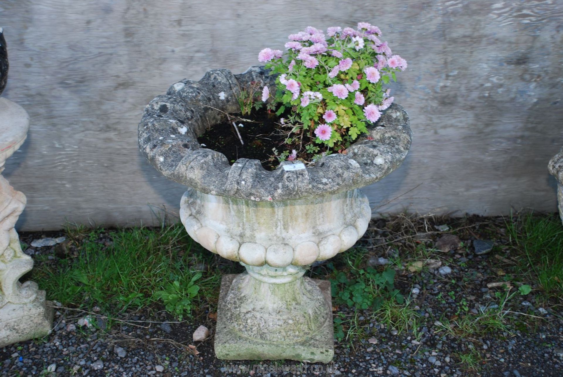 Planted garden urn,