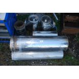 Quantity of stainless steel flue pipe and soot access traps