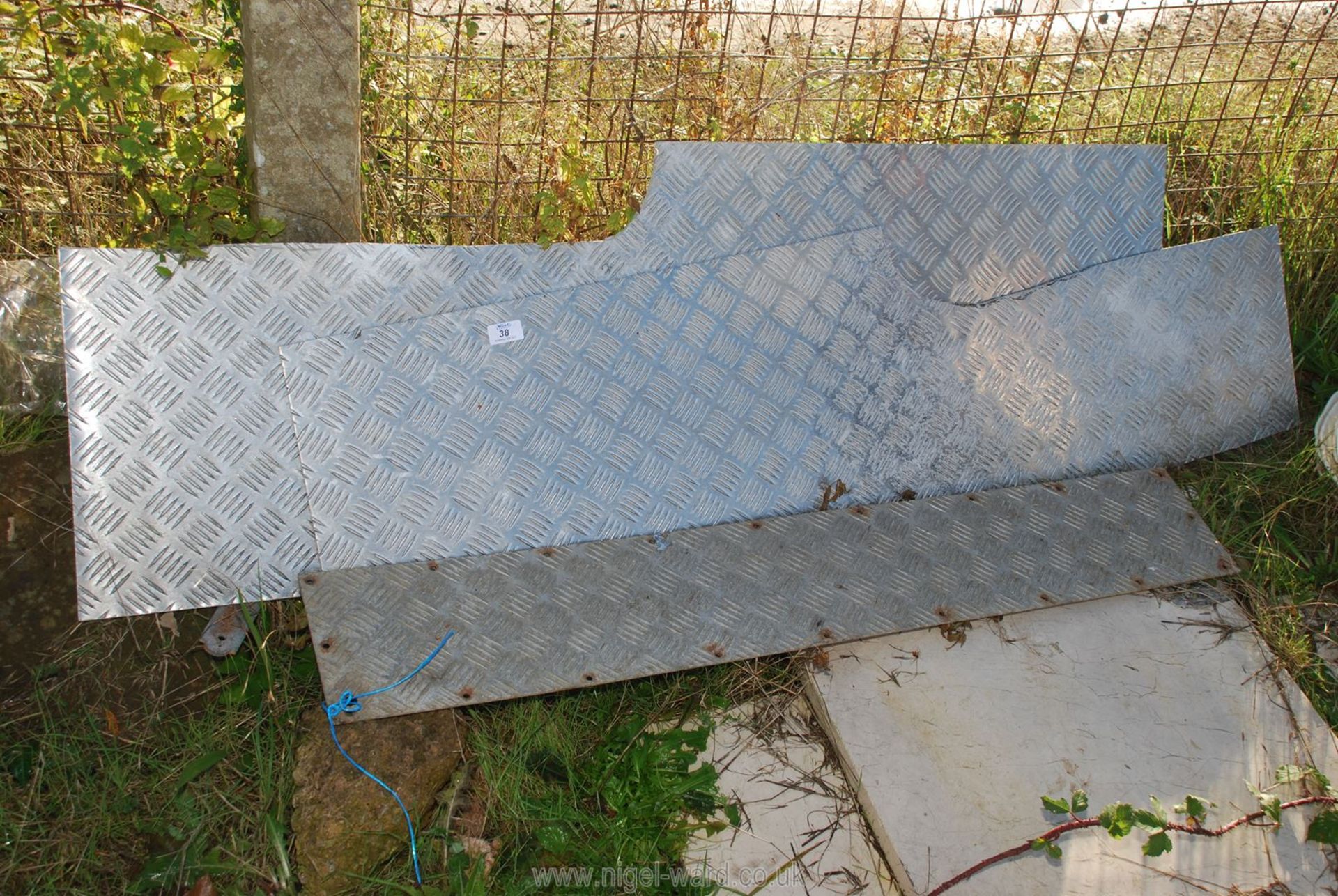 Three pieces of aluminium chequer plate