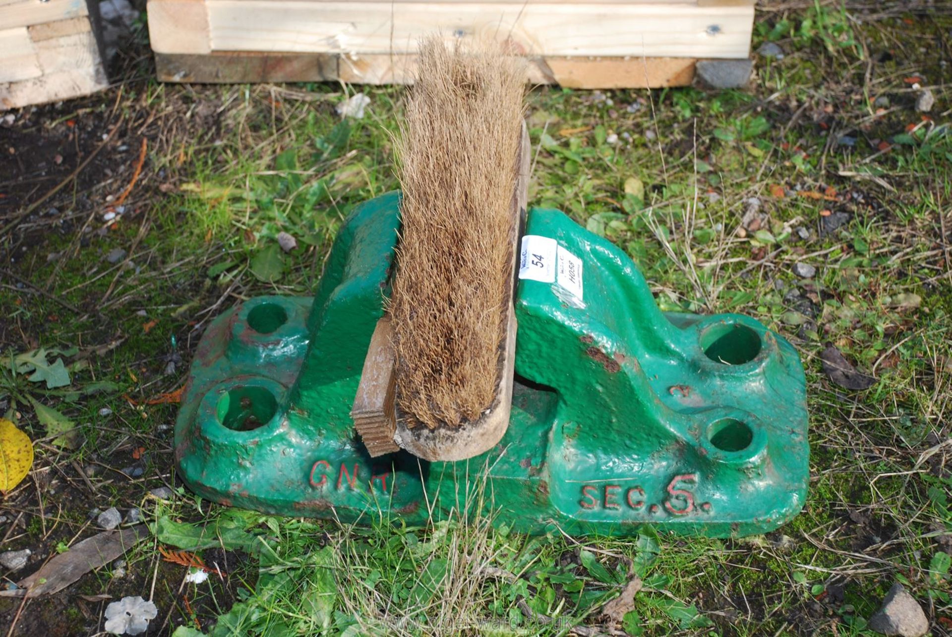 Boot cleaner made from a Great Northern railway cast iron rail chair