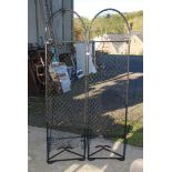 Two plastic framed sweet pea trellises