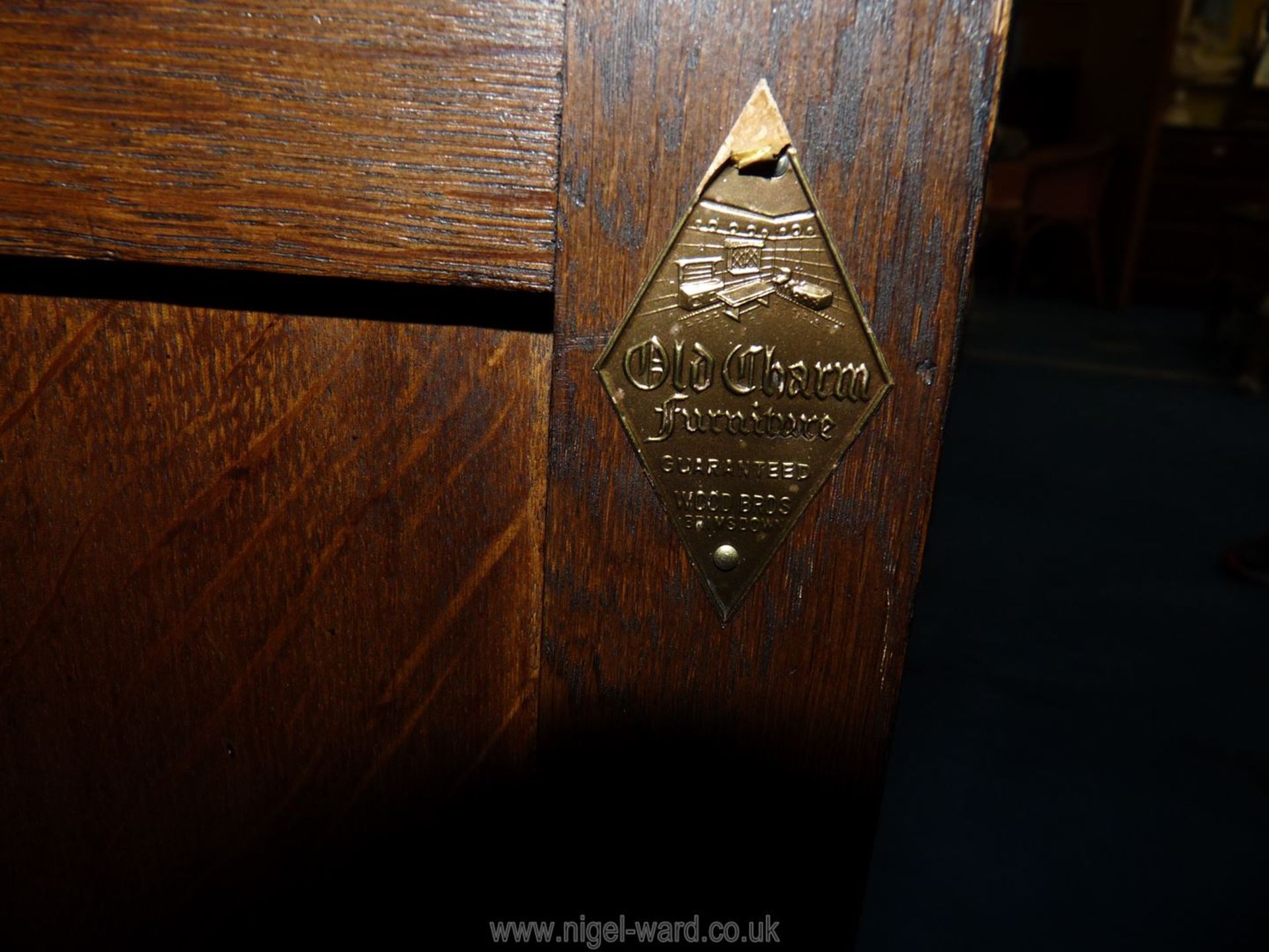 A hall cupboard with angled edges and carved door, 32" wide x 14" deep x 27 1/2" high. - Image 2 of 2