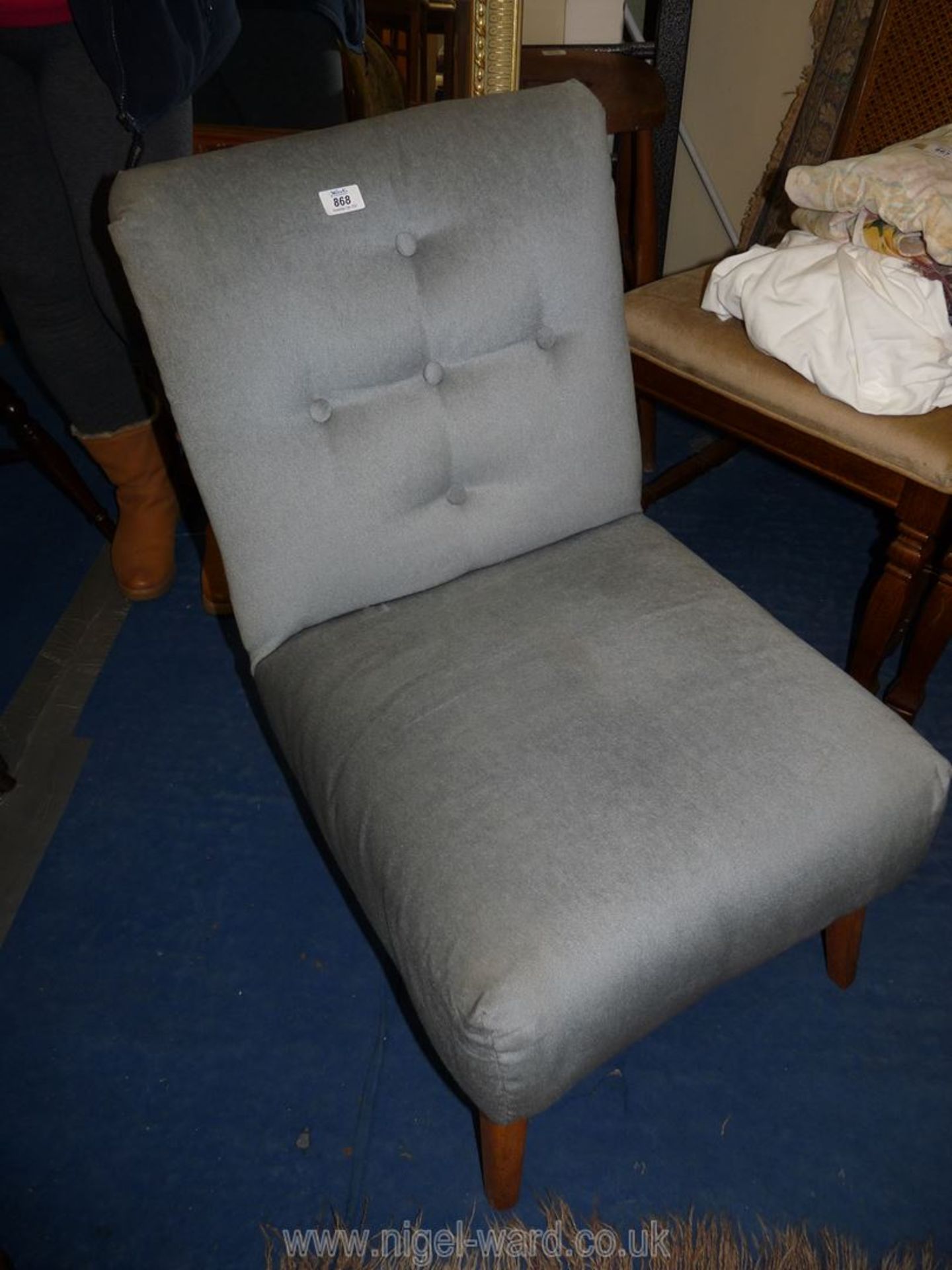 A draylon upholstered low hall chair.