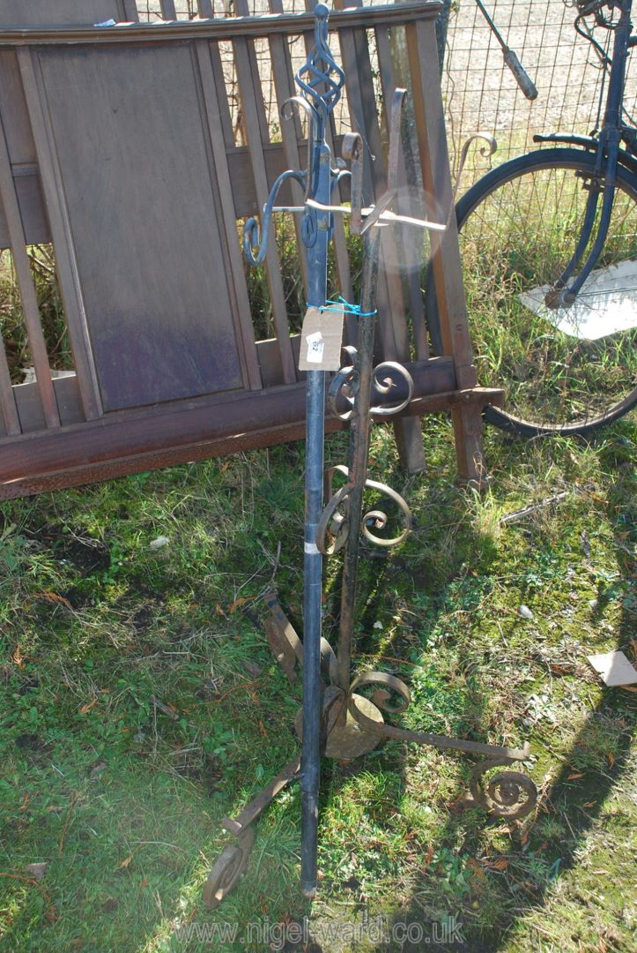 Metal plant stand and a bird feeder bracket