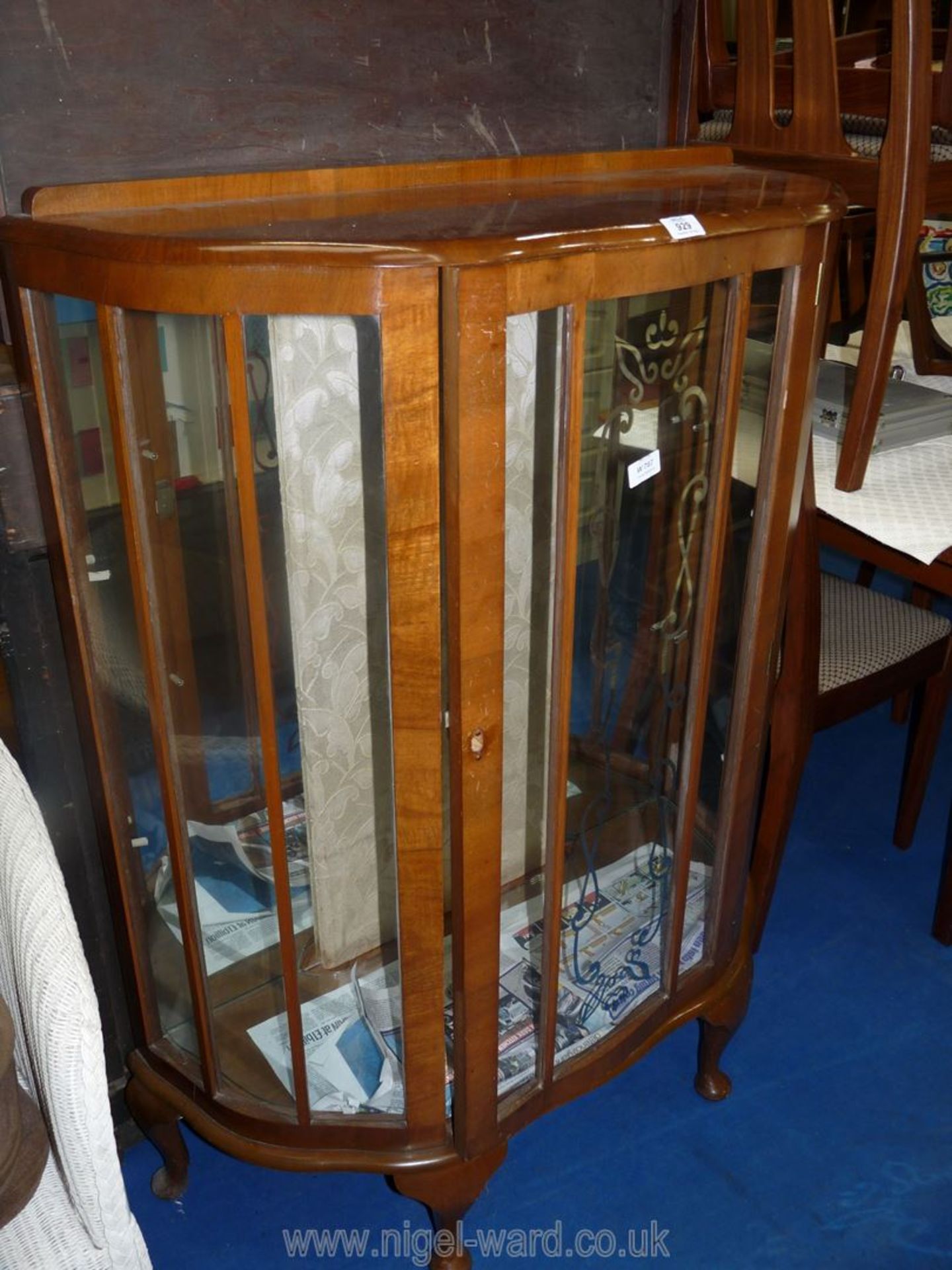 A china display cabinet with glass shelves, 34" wide x 13 1/2" deep x 45" high.