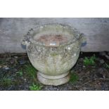 Concrete planter (chip to base), 17'' high x 19'' diameter.