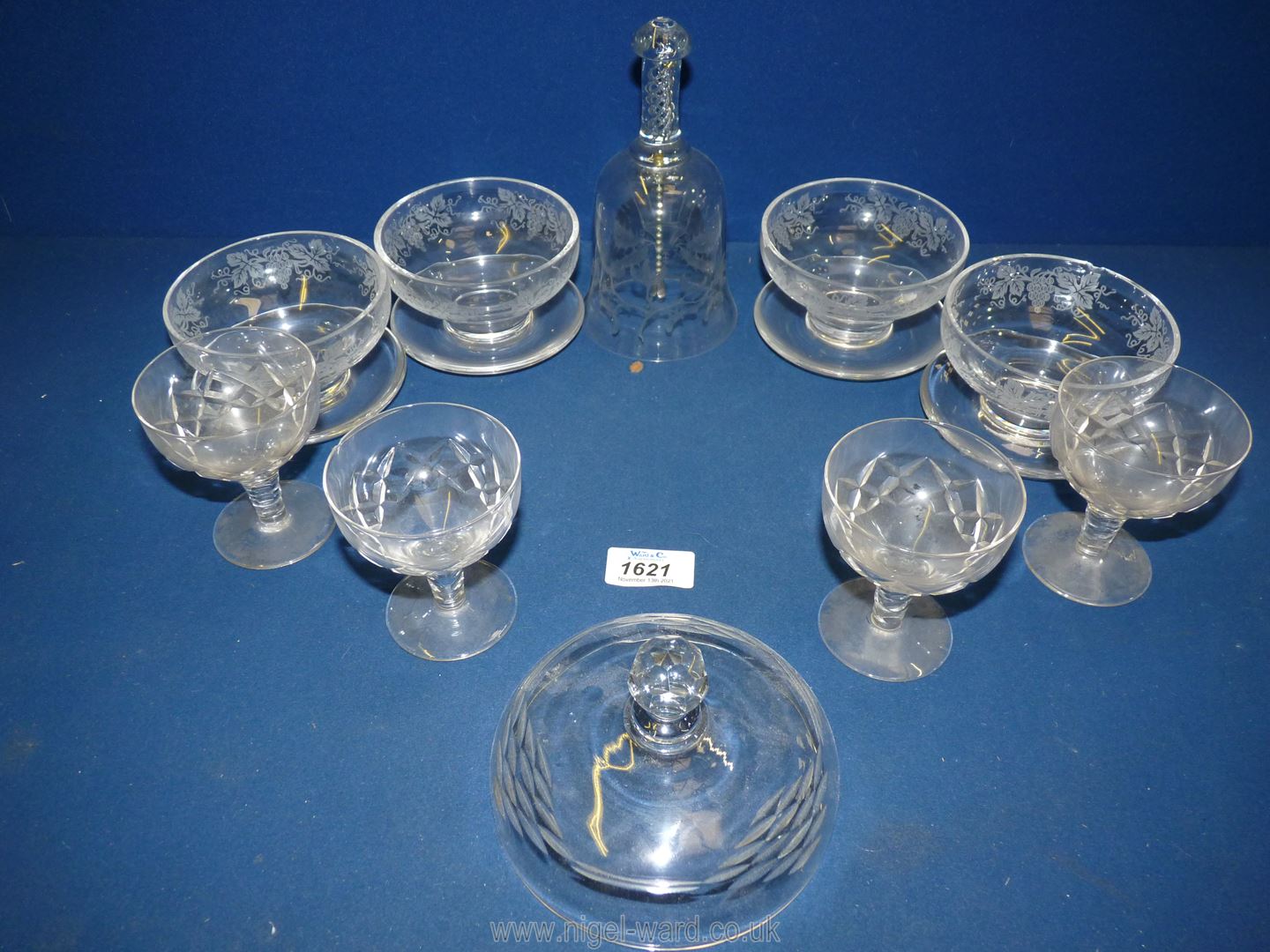A box of glass including an engraved 1971 Christmas bell by C.P. Kimberley, fruit dishes etc.