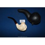 A lovely vintage Meerschaum pipe carved as an eagles claw holding an egg in its original case.