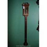 An attractive Mahogany mercury stick Barometer with square brass face engraved Thos Wright,