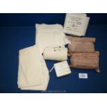 A small quantity of vintage First Aid dressings, bandages, elastic band, etc.