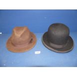 A Trilby hat and a Bowler hat (size 7 1/2).