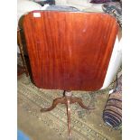 A rectangular snap top Mahogany Occasional Table standing on a turned pillar and with four splay