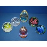 Six paperweights including Murano, floral, bubble.