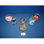 Six assorted paperweights to include; floral pattern, fish, etc.