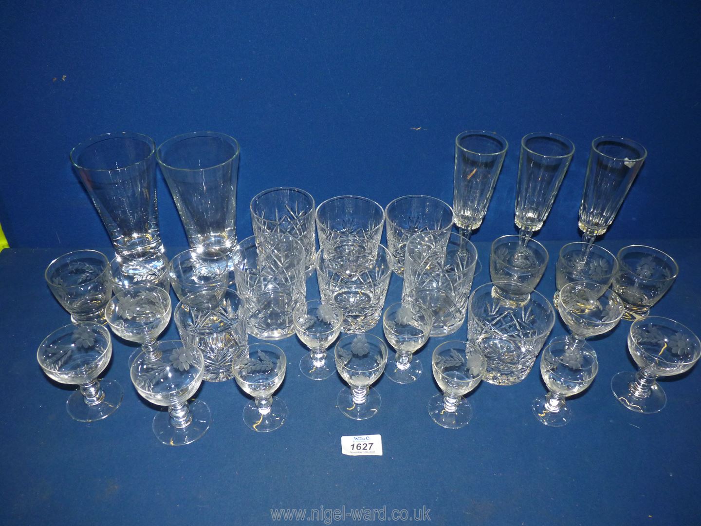 A quantity of glasses including tumblers, champagne flutes, floral engraved liqueur glasses etc. - Image 2 of 2