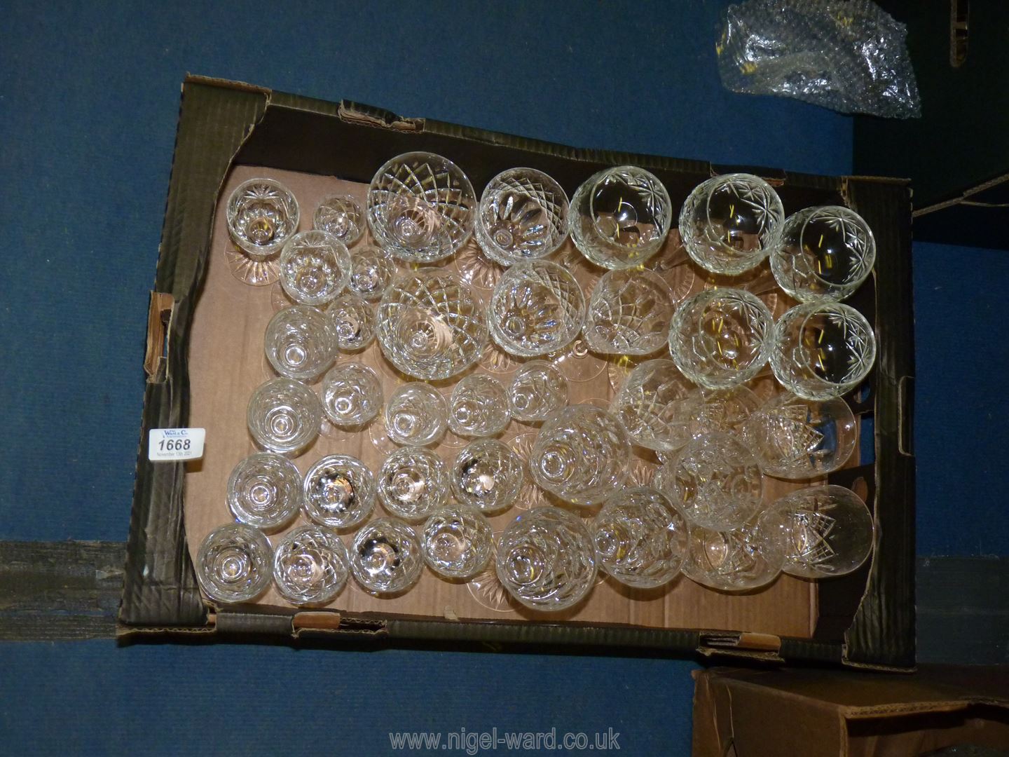 A large quantity of cut glasses including five hock glasses, Brierley liqueur glasses,