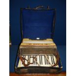 A cased German made embellished Alvari piano accordion, a/f.