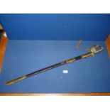 A naval Sword having nicely decorated blade with scrollwork and crown and anchor detail,