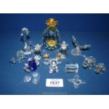 A quantity of small glass figures including pineapples, elephants, turtles, bear, flowers etc.