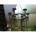 A wrought iron medieval style six holder candle ceiling light **