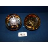 Two brown Caithness paperweights to include, The Queens Jubilee and 50th anniversary.
