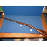 A Percussion cap single barrel sporting gun, the 30'' long Damascus barrel, 18mm calibre by ''Clark,