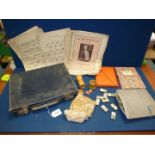 A small blue leather vintage suitcase and contents including Solitaire, Treen dice box,