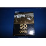 A first edition book, Fifty Years of Formula One 1999.