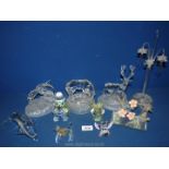 A quantity of glass animals including mare and foal, stag, dolphins, blown glass humming birds,
