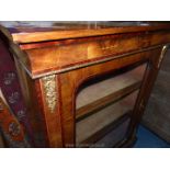 A Victorian Walnut Pier/Side Cabinet having ormolu mounts, banded and inlaid detail,