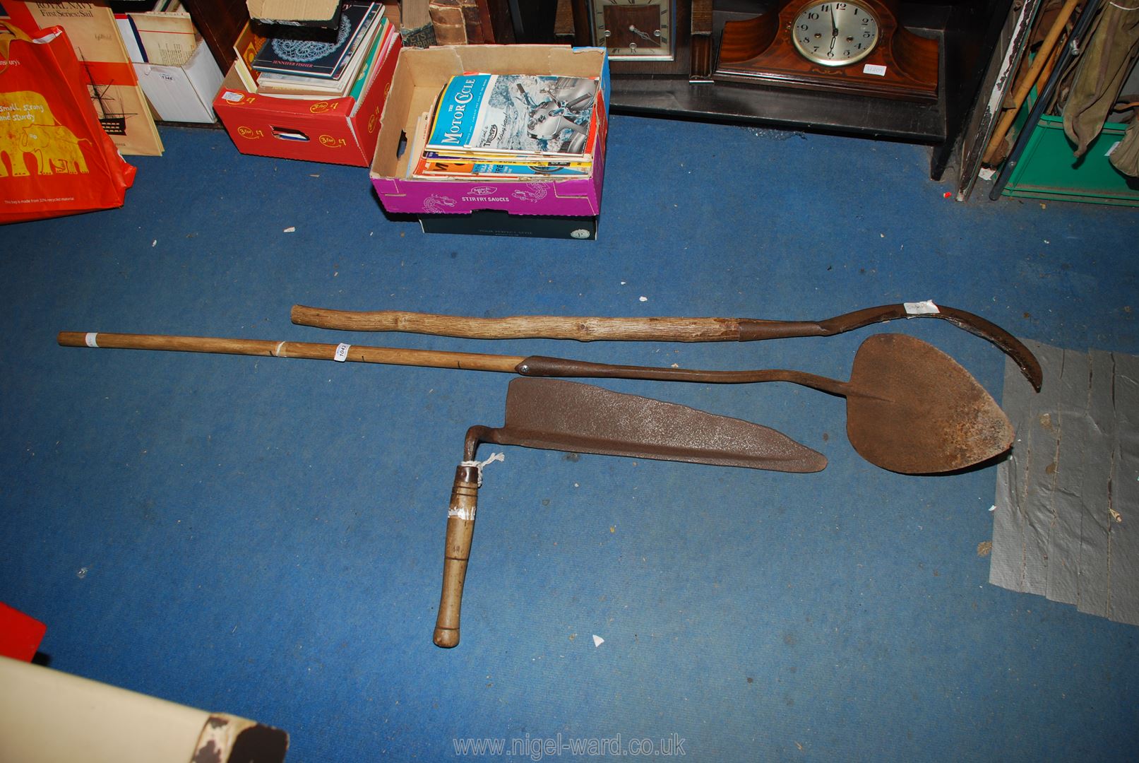 Three vintage agricultural hand tools : Hay cutter, foundry made Bill Hook and Turf Lifter.