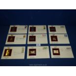 Nine Golden Replicas of United States stamps.