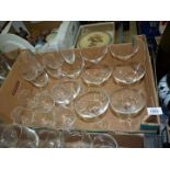 Eight Martini glasses, six etched brandy balloons and other wine glasses.
