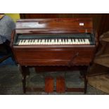 An extremely compact Ships harmonium/Organ, 3 5/8 octaves, 34 1/2'' w x 13 1/2'' d x 32 1/2'' h.