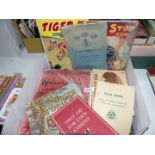 A box of books: Weldon's Practical Needlework, First Aid for Farm Animals, Farm Safety,