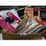 A quantity of 45 rpm records including Cliff Richard, Elvis Presley, The Beatles,