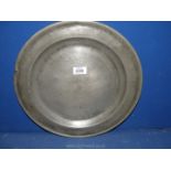 A large Pewter wall plate, 15".
